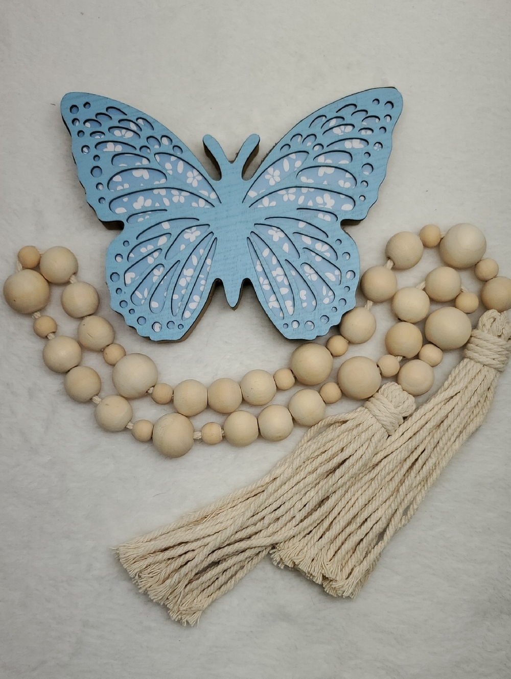 Blue Wood Freestanding Butterfly Decor & Natural Beaded Garland